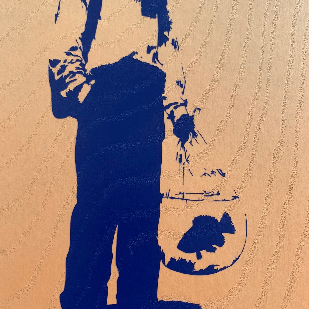 Homme avec un poisson