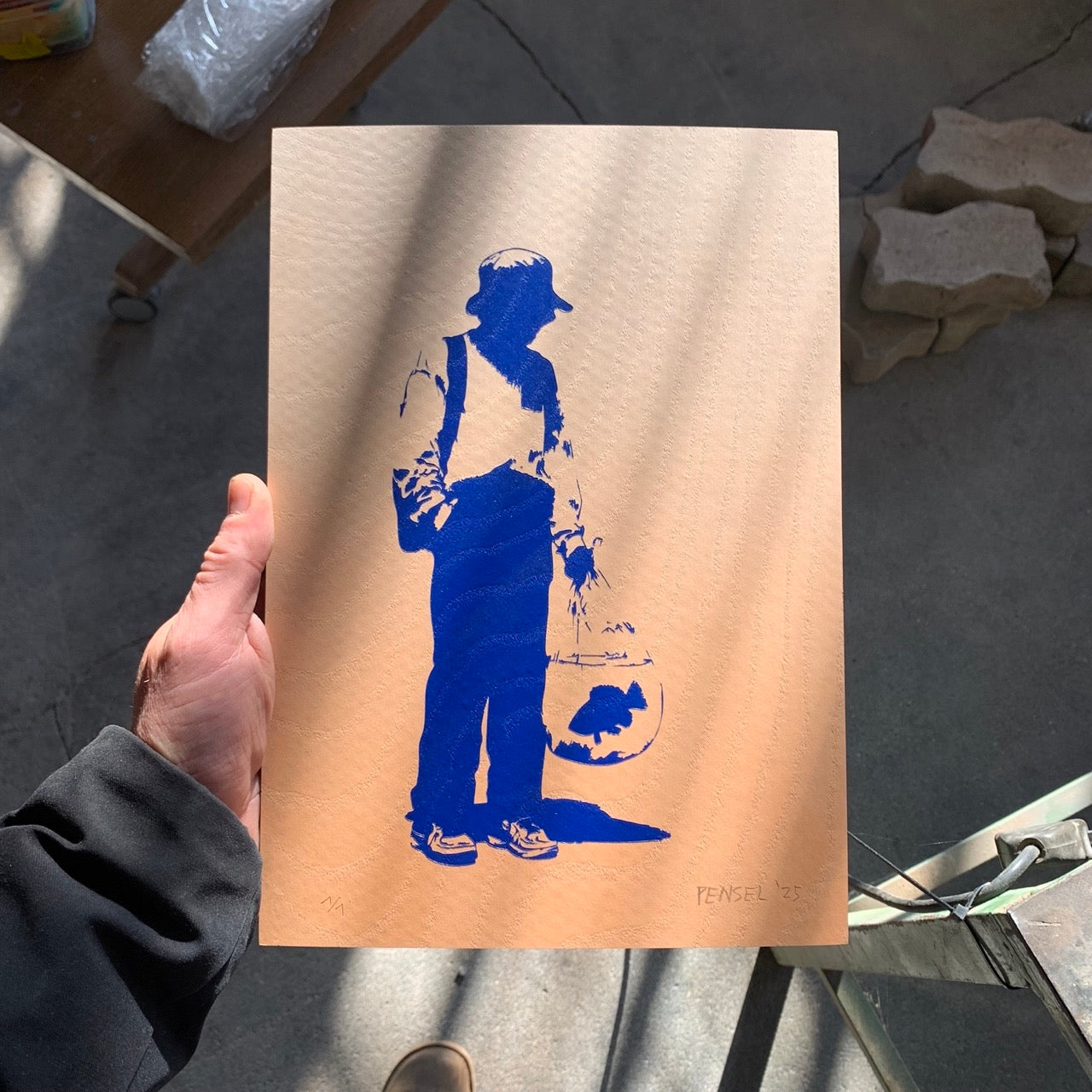 Homme avec un poisson