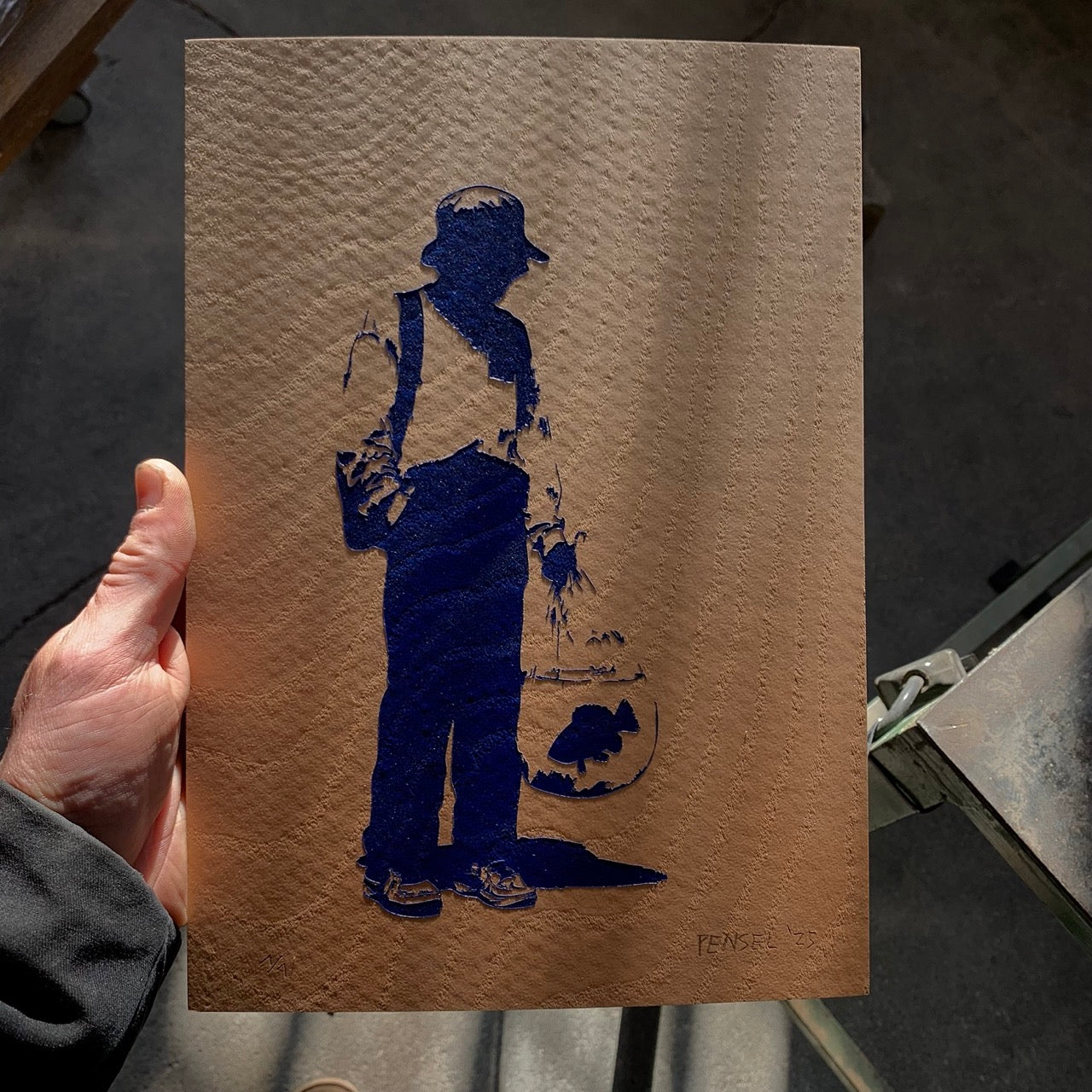 Homme avec un poisson